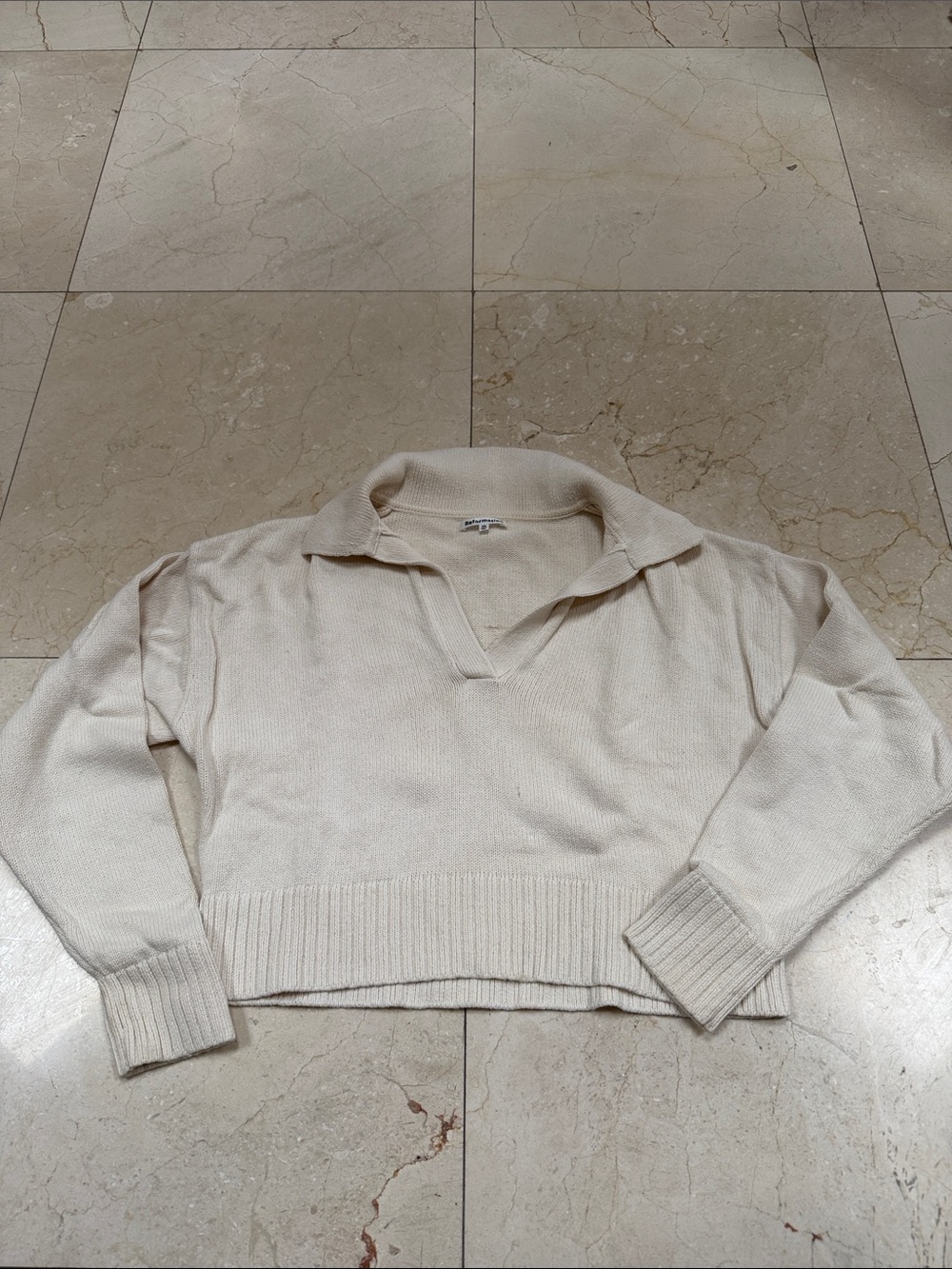 Reformation cream knit sweater.
